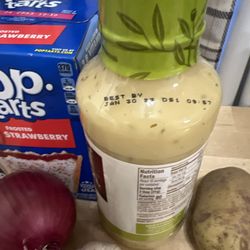 Three Rivers Market - expired salad dressing. everything total of almost 19 dollars. 2 dollars each onion, garlic and potato
