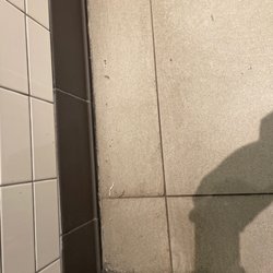 Starbucks - I guess you just sweep the dirt behind the door.