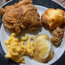 Krispy Krunchy Chicken - Chicken, biscuit, mashed potatoes and gravy, macaroni and cheese, and jambalaya.