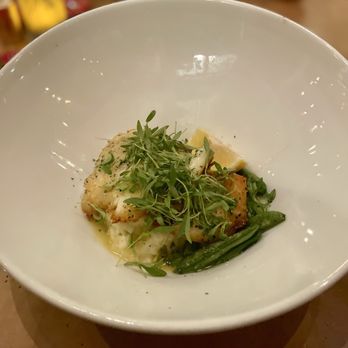 La Plazuela - Amazing Pan-Seared Chilean Sea Bass with green chili risotto and sugar snap peas in a citrus beurre blanc - New American Near Me - Santa Fe, New Mexico