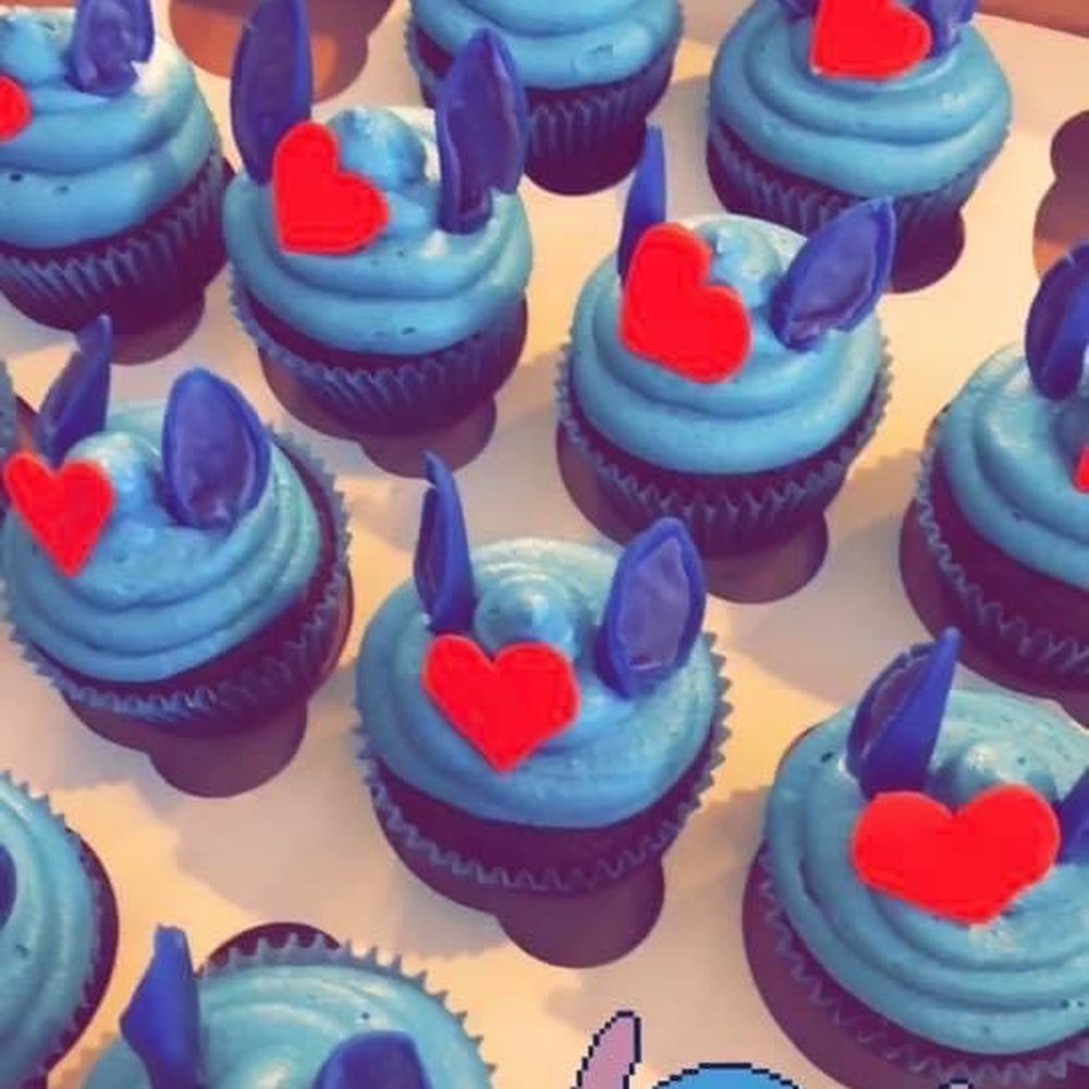 The Cake Cabin - a box of cupcakes with blue frosting - Bakeries Near Me - Austintown, Ohio The Cake Cabin - a box of cupcakes with blue frosting - Bakeries Near Me - Austintown, Ohio