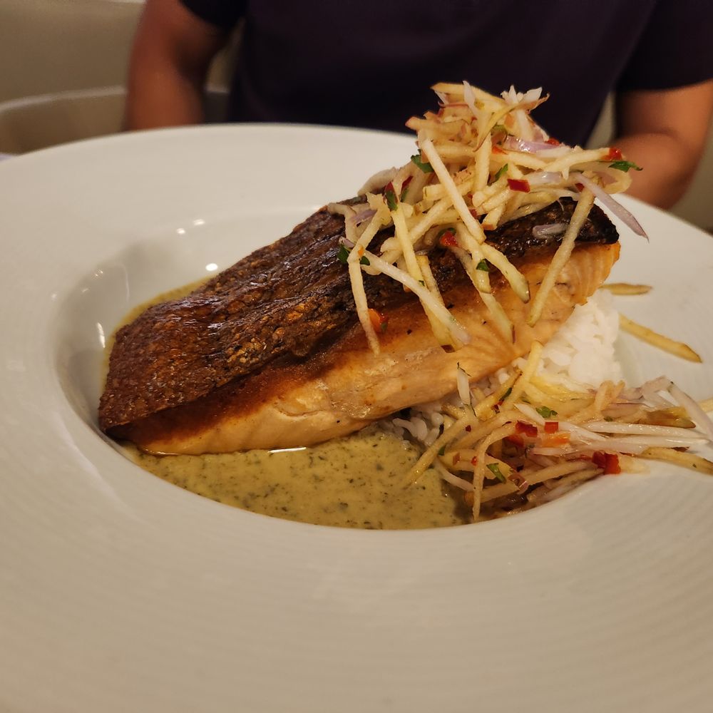 Ramsay's Kitchen - Crispy Skin Salmon - nice large slice of salmon with delicious coconut curry sauce - New American Near Me - Las Vegas, Nevada