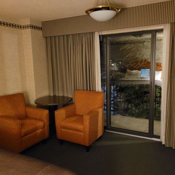 Banff Park Lodge - Nice little sitting area and balcony in my room. - Hotels Near Me - Banff, Alberta