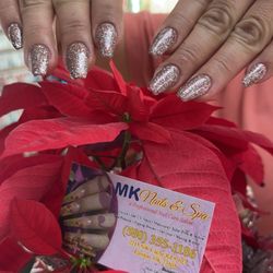 MK Nails and Spa - Went in for a full acrylic set. The polish is rainbow glitter! Coffin is my shape.