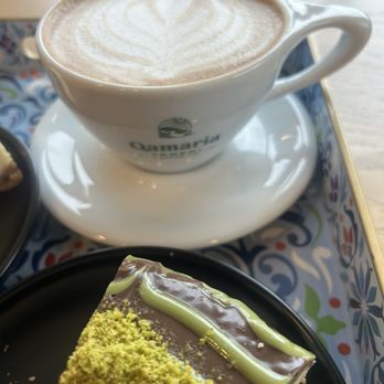 Qamaria Coffee - Qamaria Latte + Pistachio Cheesecake - Coffee & Tea Near Me - Fullerton, California