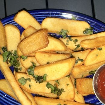 Dean's Mediterreanean Table - Side of fries garlic, cilantro flavor - Mediterranean Near Me - Cincinnati, Ohio Dean's Mediterreanean Table - Side of fries garlic, cilantro flavor - Mediterranean Near Me - Cincinnati, Ohio