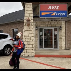 Avis Car Rental - Person, Avis sign