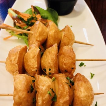 Kubo - Scuttle or fish balls--they come with some orange dipping sauce. Ask for a simpler vinegar, garlic and sili dip. You'll love it. - Filipino Near Me - Chicago, Illinois