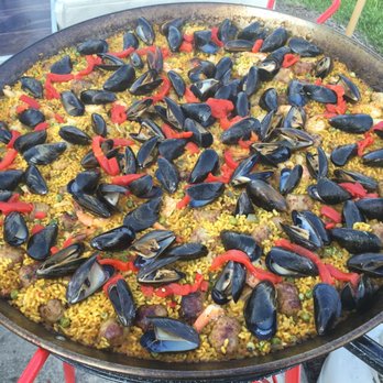Paella Perfecta - A seafood paella featuring delicious mussels. - Spanish Near Me Paella Perfecta - A seafood paella featuring delicious mussels. - Spanish Near Me