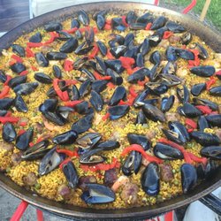 Paella Perfecta - A seafood paella featuring delicious mussels.
