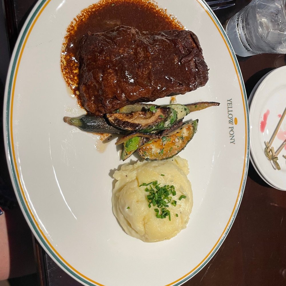 Yellow Pony Pub & Garden - Short Ribs, grilled Zucchini and Mashed Potatoes - Lounges Near Me - Ocala, Florida Yellow Pony Pub & Garden - Short Ribs, grilled Zucchini and Mashed Potatoes - Lounges Near Me - Ocala, Florida