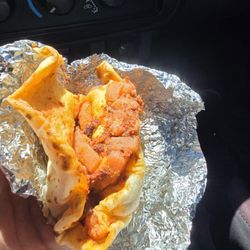 Yoya's Market & Valero - Sad  red chileand meat  oh potato  burrito