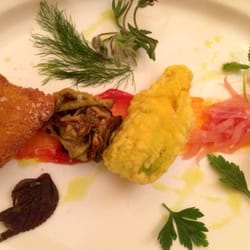 Fritto misto piemontese (fried brains, fried zucchini flower, fried dough, braised zucchini and onions)