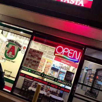 Amina Pizzeria - Outside of establishment at night - Pizza Near Me - Honolulu, Hawaii Amina Pizzeria - Outside of establishment at night - Pizza Near Me - Honolulu, Hawaii