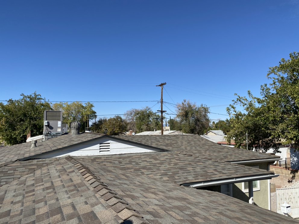 Slide of Benny’s Roofing Services