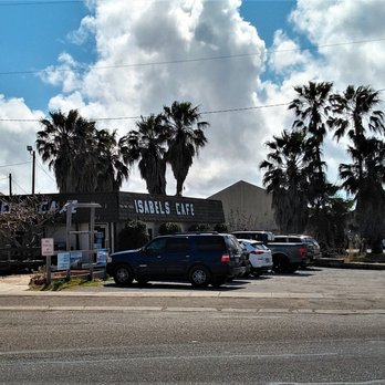 Isabel's Cafe - Here you see Isabel's Cafe, parking lot, palm trees, and, on a clear day, you can see Walmart beyond. I guess it works as a reference point. - Mexican Near Me - Port Isabel, Texas