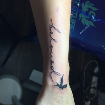 Rings of Fire - my friend's wrist (in her own writing), by Laura - Piercing Near Me - San Antonio, Texas