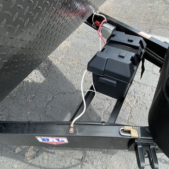 La Mesa RecVan - Tucson - A single battery and the grounding wires installed and exposed to the elements. - RV Dealers Near Me - Tucson, Arizona