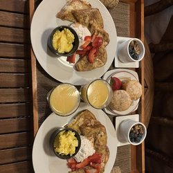 The Fern Lodge - Breakfast one day. French toast, fruit, eggs, whipped cream, yogurt with granola, muffins and juice