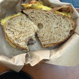 Bacon egg and cheese sandwich on sourdough bread