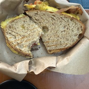 Coz Coffee Roasting Company - Bacon egg and cheese sandwich on sourdough bread - Coffee & Tea Near Me - Cozumel, ROO
