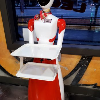 TURKY ON THE LOOSE - robot holding a tray - Barbeque Near Me - Riverdale, Georgia TURKY ON THE LOOSE - robot holding a tray - Barbeque Near Me - Riverdale, Georgia