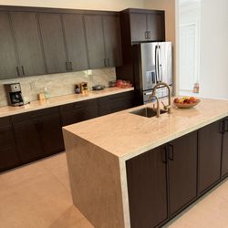 Choice Granite & Kitchen Cabinets - Eagle Rock kitchen remodel: walnut shaker cabinets, Taj Mahal quartzite slabs, full backsplash & waterfall. Serving LA, Pasadena, Glendale.