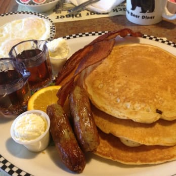 Black Bear Diner Gilbert - Wow! The volcano for under $9: 3 pancakes, 2 bacon, 2 sausage, and an egg (normally on top) - American Near Me - Gilbert, Arizona