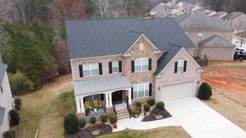 Slide of Whitaker Roofing Company