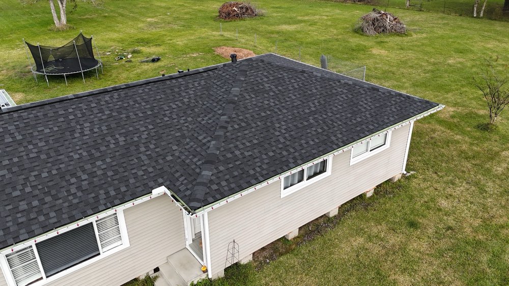 Slide of CG Roofing Solutions