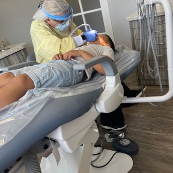 Bayview Pediatric Dental Group - Watching his favorite YouTube channel while getting his teeth cleaned - Pediatric Dentists Near Me - Manhattan Beach, California