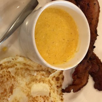 Yolk - South Loop - Eggs and protein with cheesy grits - Breakfast & Brunch Near Me - Chicago, Illinois Yolk - South Loop - Eggs and protein with cheesy grits - Breakfast & Brunch Near Me - Chicago, Illinois