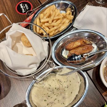 Texas de Brazil - Grand Rapids - Garlic Mashed Potatoes, Dozen Brazilian Cheese Breads, fries, plantains - Brazilian Near Me - Grand Rapids, Michigan