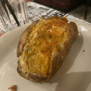 Backwoods Inn - Gian stuffed potato - Steakhouses Near Me - Santa Clarita, California Backwoods Inn - Gian stuffed potato - Steakhouses Near Me - Santa Clarita, California