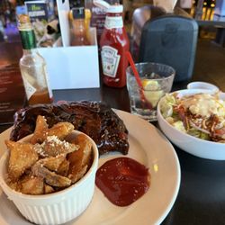 Memories Bar & Grill - A half rack with blue cheese house salad and wedge potatoes!