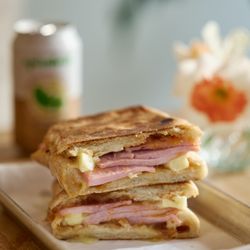 Pip’s Cafe and Provisions - The Ham Toastie--pressed sandwich with Black Forest ham, house-made apple jam, and cultured butter on house-baked demi ciabatta
