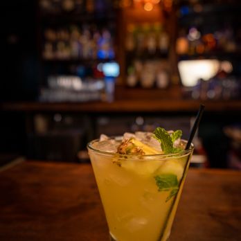 The Crown Bar - a glass of lemonade on a bar - Whiskey Bars Near Me - La Grange, Texas