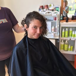 Julia cutting Alex's hair
