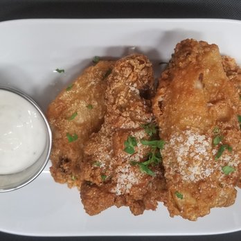 Roast - a plate of fried chicken with a side of sour cream - Halal Near Me - Pompano Beach, Florida Roast - a plate of fried chicken with a side of sour cream - Halal Near Me - Pompano Beach, Florida