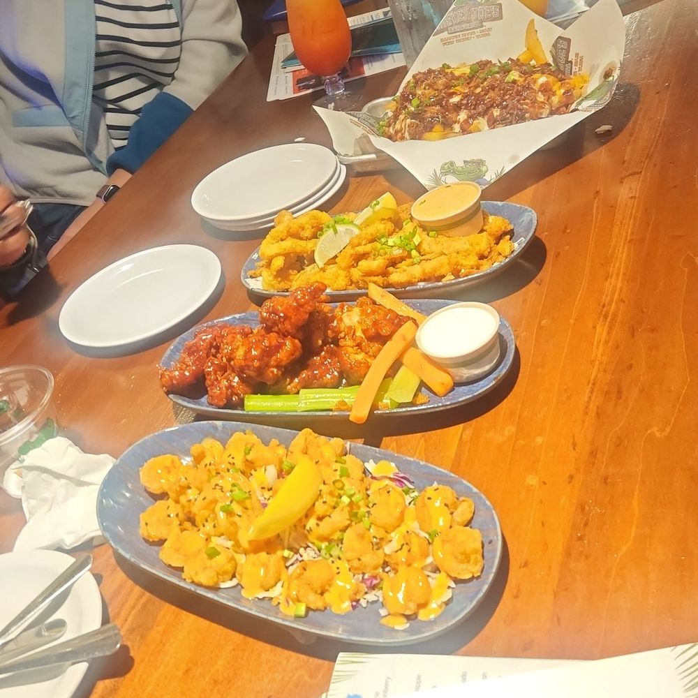 Whiskey Cake - Appetizers of calamari, boneless chicken, loaded fries, and spicy shrimp - New American Near Me - Tampa, Florida Whiskey Cake - Appetizers of calamari, boneless chicken, loaded fries, and spicy shrimp - New American Near Me - Tampa, Florida