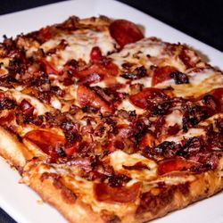 Rosie's Italian Grille - Our famous pizza with pepperoni and crisp bacon