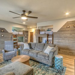 Owlhaven Vacation Rental - Kids will love playing and sleeping in the  pirate ship bunk beds in this comfy family room.