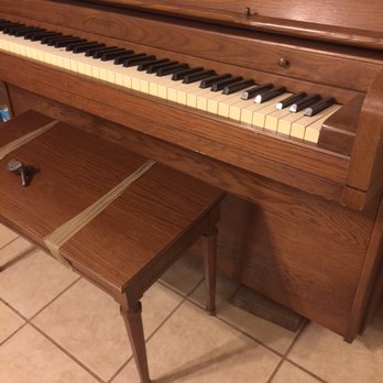 M & M Moving Company - Piano without legs, propped on bricks - also without music stand. - Movers Near Me M & M Moving Company - Piano without legs, propped on bricks - also without music stand. - Movers Near Me