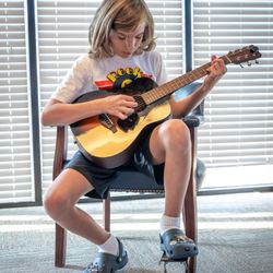 Guitar Class student practicing!