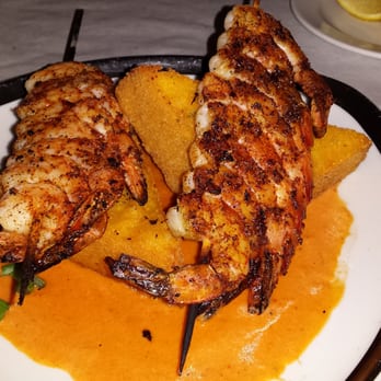 The Black Molly Grill - Shrimp and goat cheese grit cakes. - American Near Me - St. Augustine, Florida The Black Molly Grill - Shrimp and goat cheese grit cakes. - American Near Me - St. Augustine, Florida