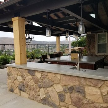Thunder Masonry & Pavers - BBQ with concrete counter top and stone veneer. - Landscaping Near Me Thunder Masonry & Pavers - BBQ with concrete counter top and stone veneer. - Landscaping Near Me