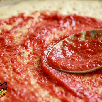 Pizza 64 - a pizza with sauce and a spoon - Pizza Near Me - Pitt Meadows, British Columbia Pizza 64 - a pizza with sauce and a spoon - Pizza Near Me - Pitt Meadows, British Columbia