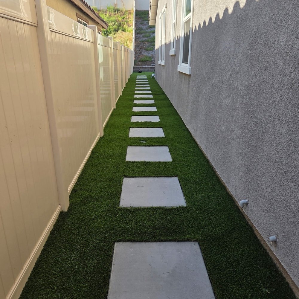 Bonafide Earthworks - Walk way to backyard added stone pavers and artificial turf - General Contractors Near Me