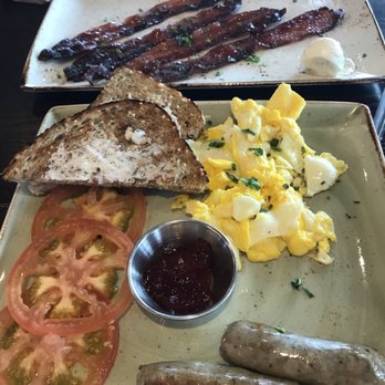 First Watch - Traditional breakfast, normally comes with potato's but I substituted for tomato's - Breakfast & Brunch Near Me - Shelby Township, Michigan First Watch - Traditional breakfast, normally comes with potato's but I substituted for tomato's - Breakfast & Brunch Near Me - Shelby Township, Michigan