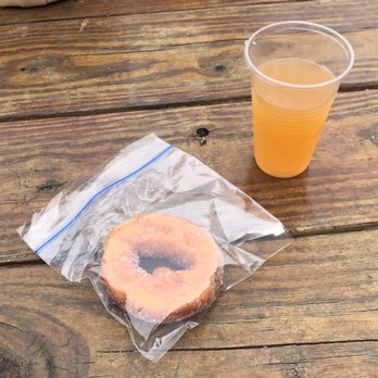 Red Apple Barn - Complementary apple cider donut with apple cider. Yummy! - Farmers Market Near Me - Ellijay, Georgia
